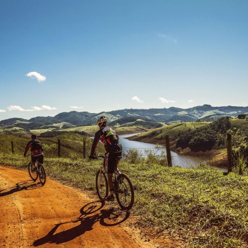 cyclists-trail-bike-clouds-163407